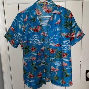Vibrant blue Hawaiian shirt 🌺